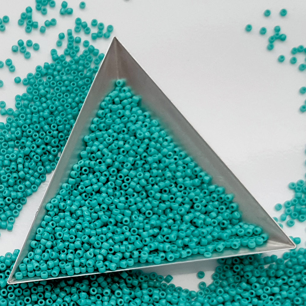 11/0 Toho seed beads in Turquoise opaque TR-55 with a triangle scoop.