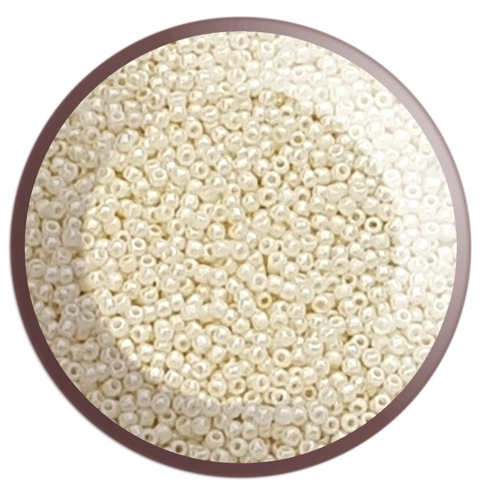 11/0 TR-122 White Navajo Opaque Luster Round Toho Seed Beads - Beading Supply Circle white background.