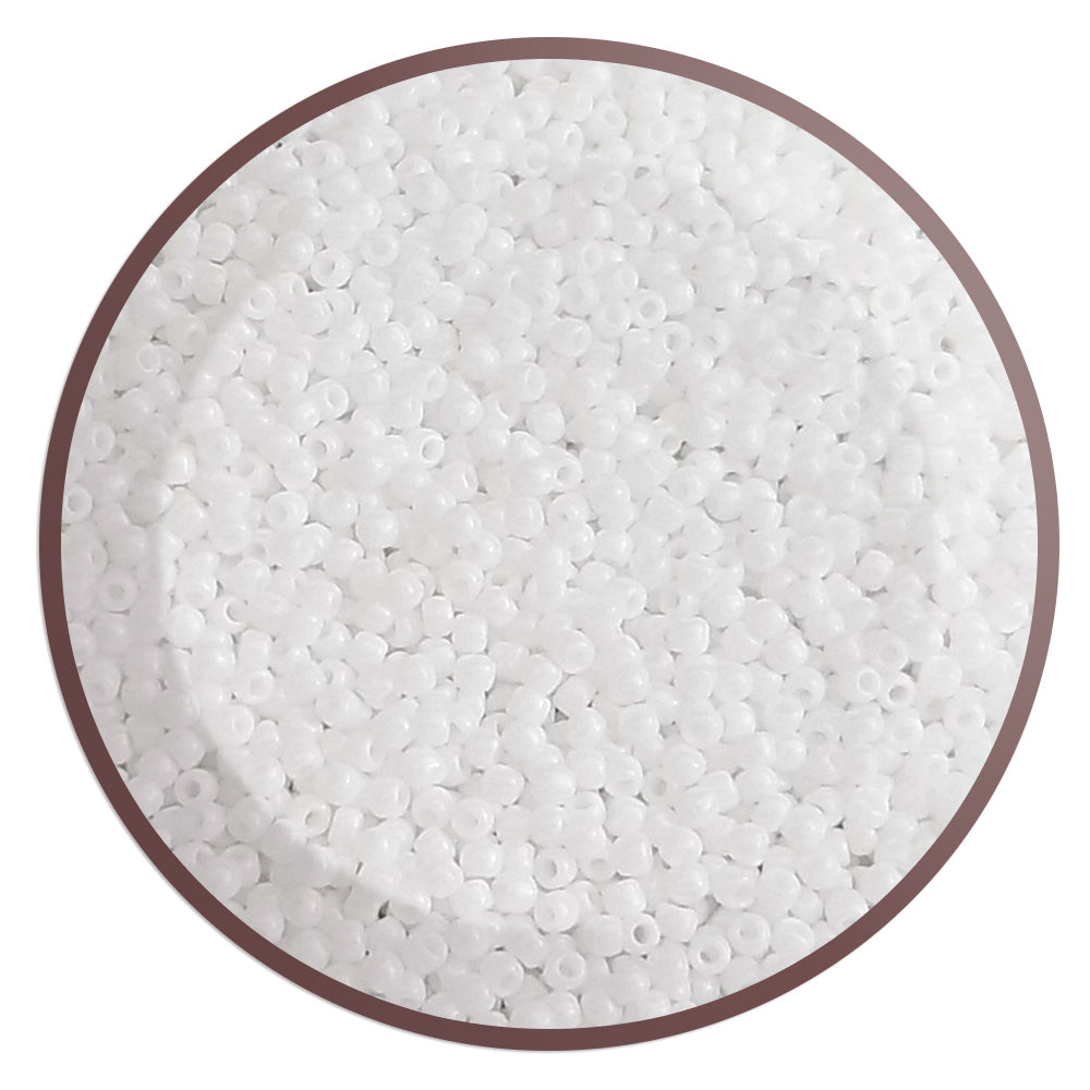 Toho 11/0 White Opaque TR-41 in a circle white background