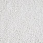 Toho 11/0 White Opaque TR-41 in a close up white background