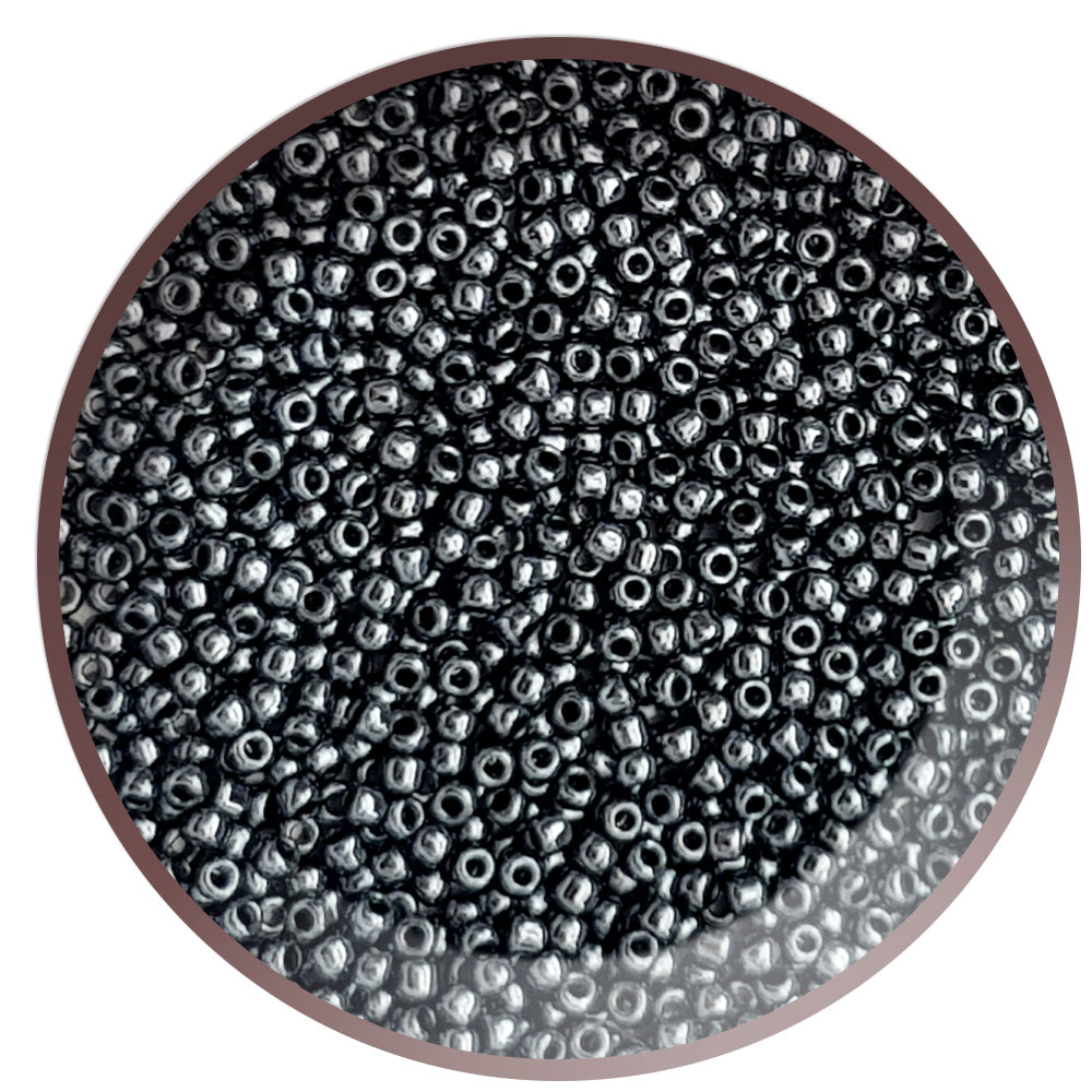 Circle showing close up of haematite metallic beads.