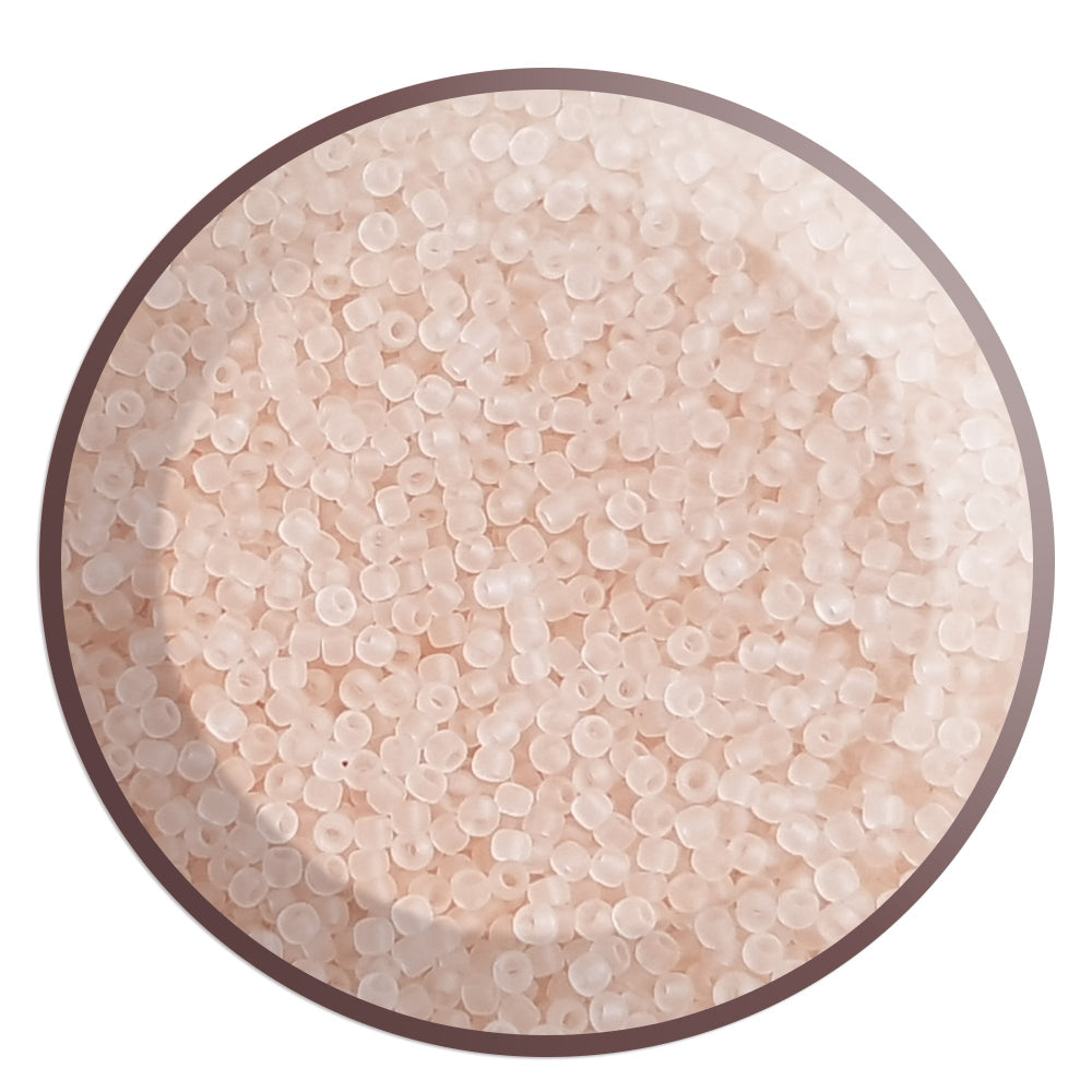 Frosted Rosaline transparent pink beads 15/0 TR-11F in a circle white background. 