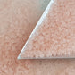 15/0 Toho Seed beads in rosaline pink frosted transparent TR-11f with triangle scoop.