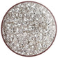 8/0 Toho Seed Beads in crystal silver-line TR-21 in a circle white background.