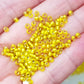 Yellow Beads Lemon frosted silver-lined 8/0 tr-32F on a hand.