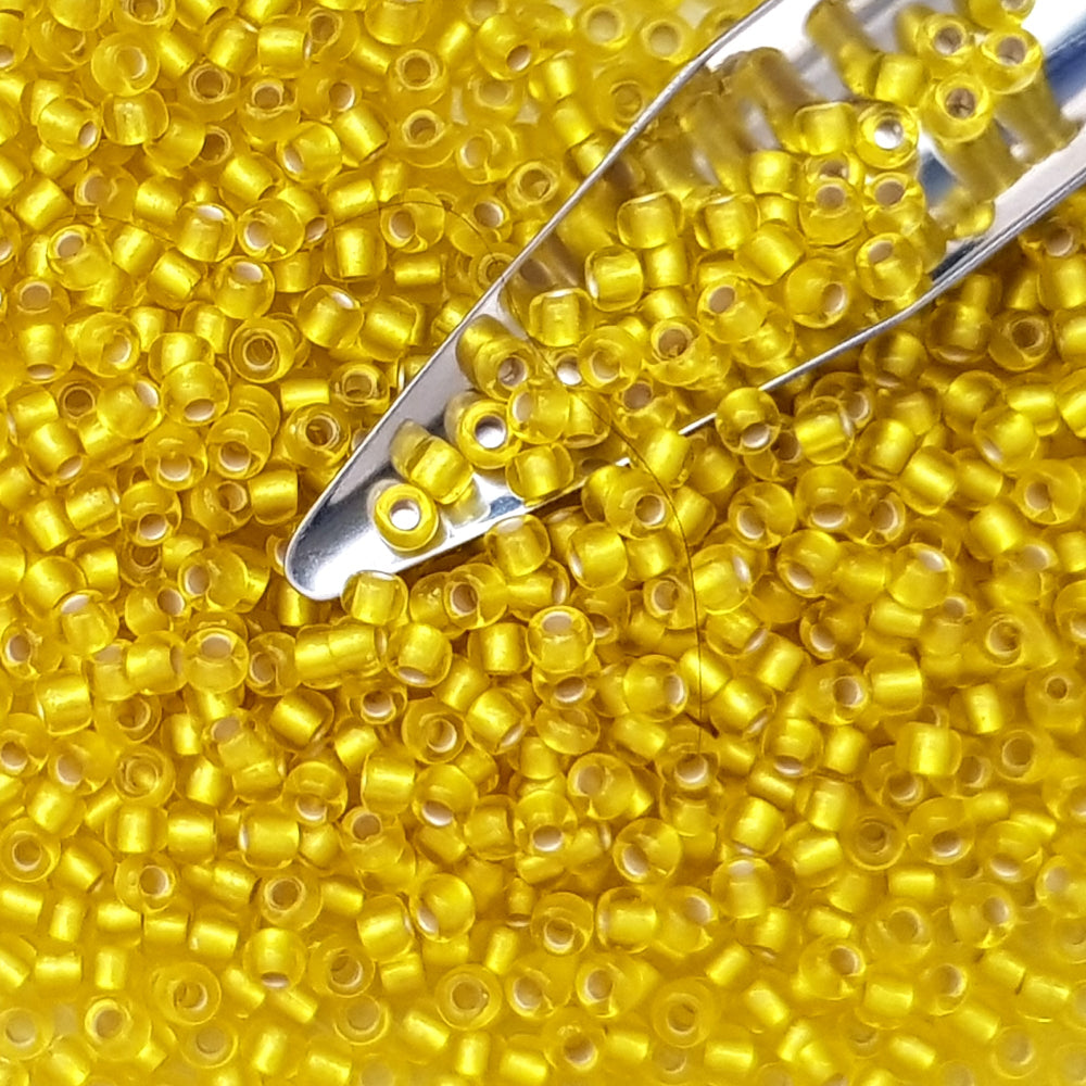 Toho Lemon Frosted Yellow 8/0 Seed Beads TR-32F beading scoop.