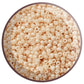 8/0 toho seed beads in lt beige luster opaque TR-123 in a circle white background.