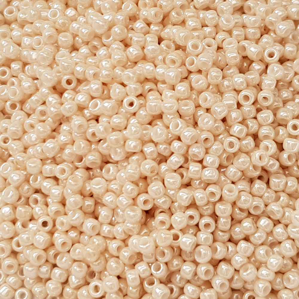 8/0 Toho seed Beads in Lt Beige Luster Opaque TR-123 close up.