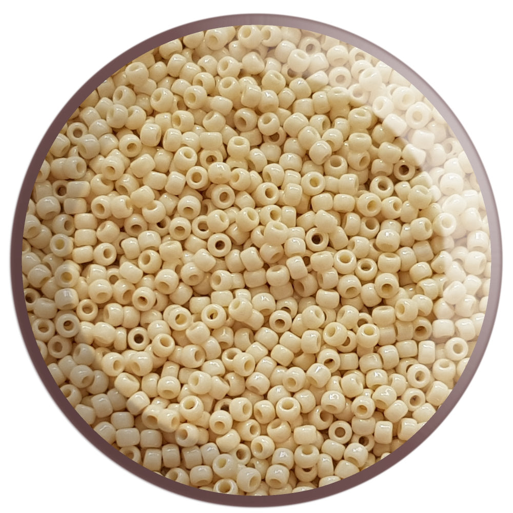 8/0 TR-51 Lt Beige Opaque Round Toho Seed Beads - in a circle white background.