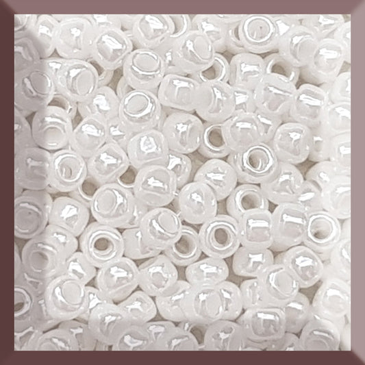 8/0 Toho Seed Beads in white Luster Opaque TR-121 close square window.