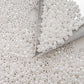 8/0 Toho seed beads in white luster opaque TR-121 with triangle scoop.