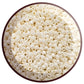 8/0 Toho Seed Beads in white Navajo luster opaque TR-122 in a circle white background,