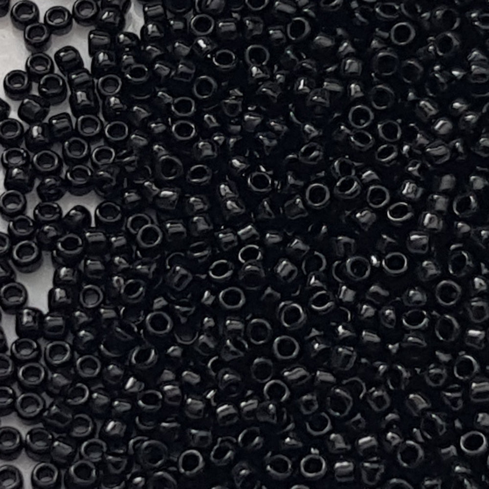 Toho seed beads 15/0 jet black opaque TR-49 close up.